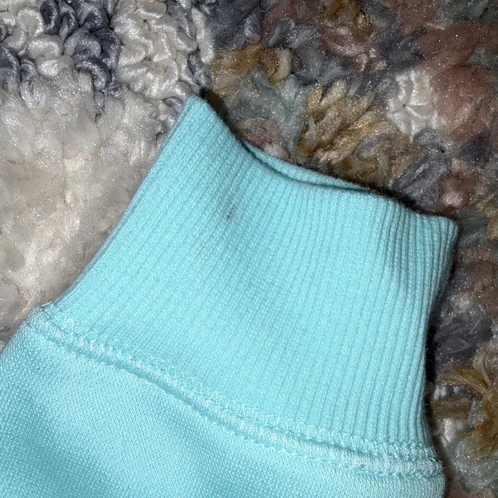 Justice Light Blue Smiley Face Hoodie